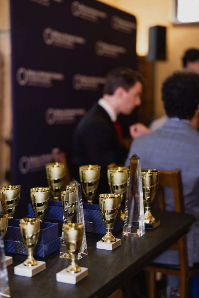 A close-up of gold trophies displayed at the World Affairs Council's Academic WorldQuest event.